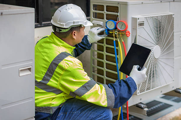 Professional Heat Pump Repair technician working in Newton Grove, NC